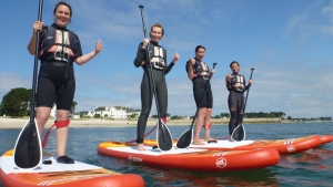 quiberon morbihan bretagne Standup paddle boarding can offer a fun and relaxing activity 